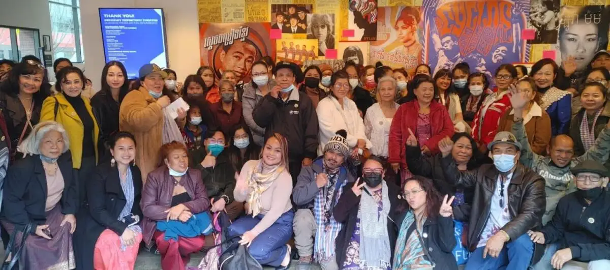 A crowd of Cambodian Americans in a theater lobby