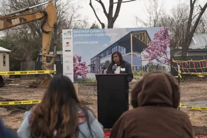 Tonda Owens speaks as the Bastrop County Emergency Food Pantry breaks ground on a new nutrition and education center Friday, Feb. 14, 2025. The new facility will feature a grocery store where neighbor’s can “shop” for their own food and will be able to double the inventory capacity of the Food Pantry to 1 million pounds.