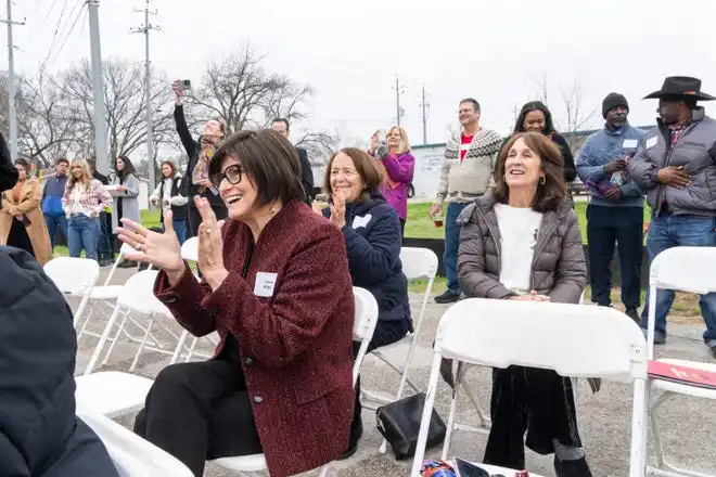 Community members applaud as the Bastrop County Emergency Food Pantry breaks ground on a new nutrition and education center Friday, Feb. 14, 2025. The new facility will feature a grocery store where neighbor’s can “shop” for their own food and will be able to double the inventory capacity of the Food Pantry to 1 million pounds.