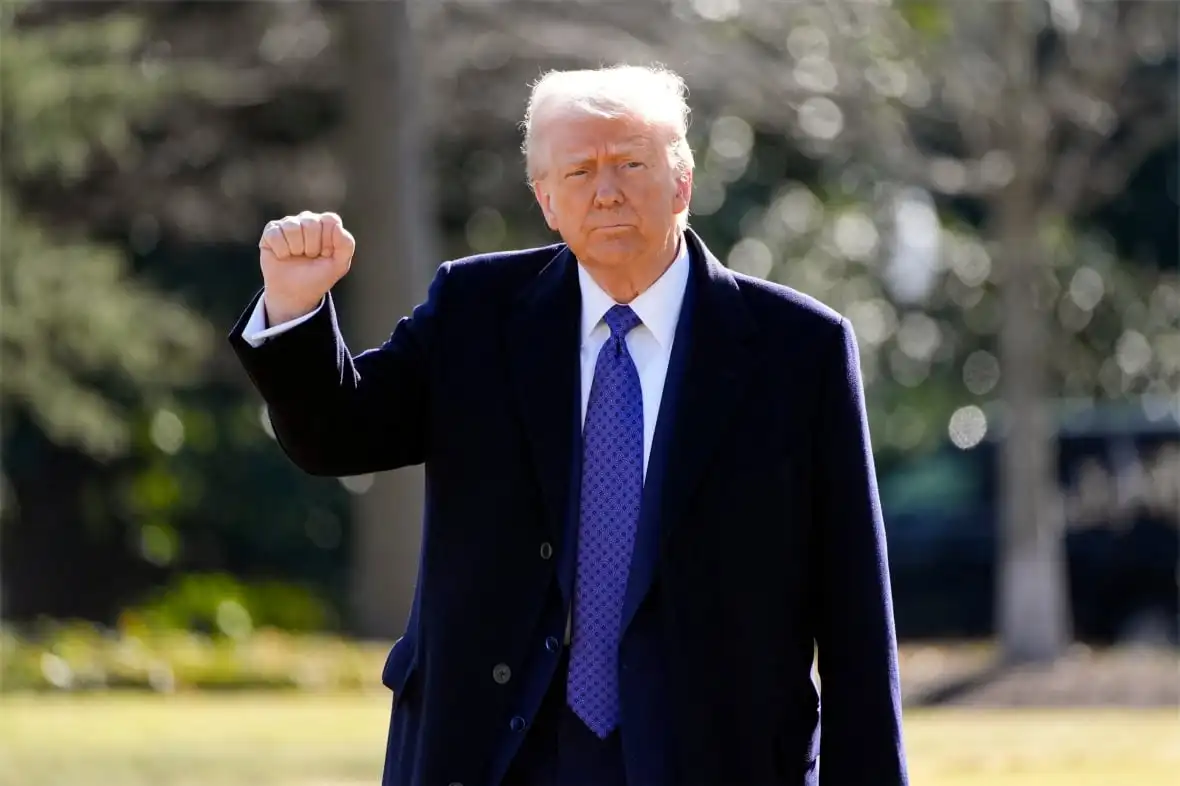 President Donald Trump walks to board Marine One on the South Lawn of the White House.