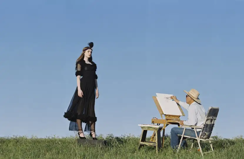 Model subject: Ali poses for artist Buck Blake in a black silk gown by Chanel, $6,055,...