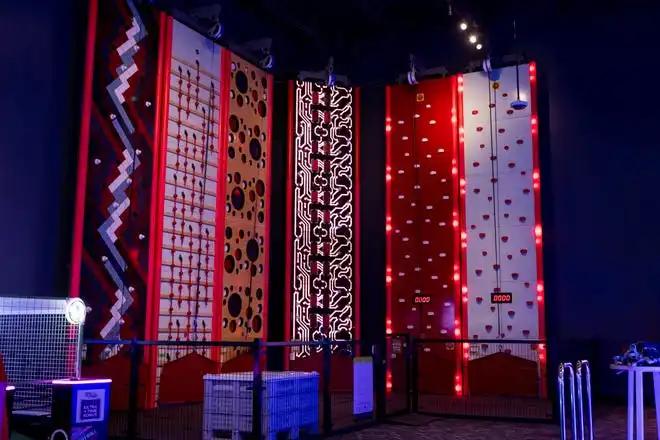 Gamescape, El Paso’s new all-ages entertainment spot by Cinemark, features a climbing wall with different challenges, as seen on Friday, Feb. 21, 2025.