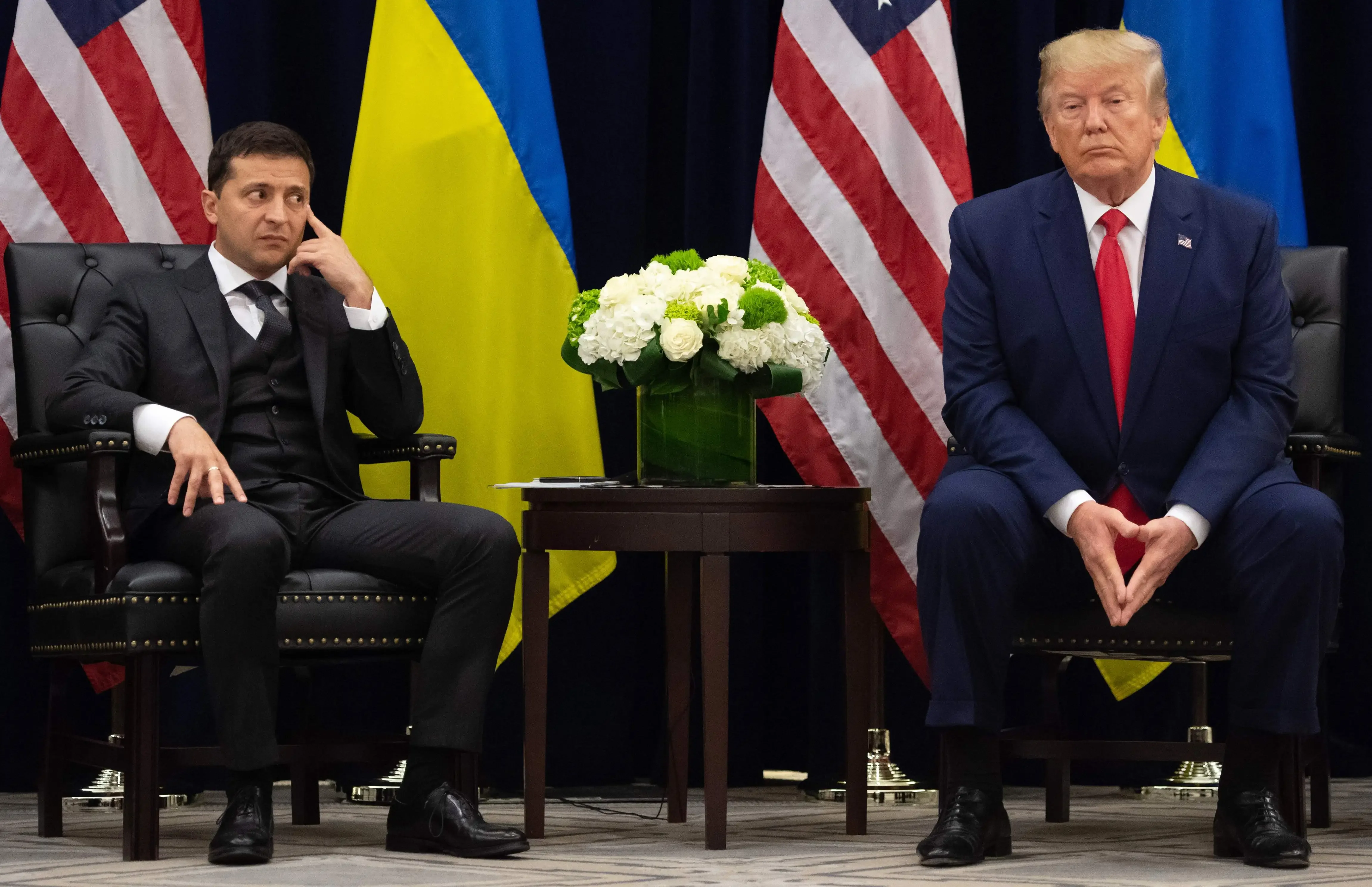 Presidents Trump and Zelenskyy seated together at a meeting.