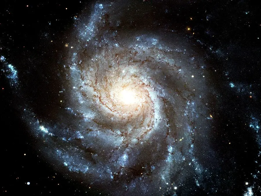 M101 (NGC 5457, The Pinwheel Galaxy). Hubble Space Telescope image of face-on spiral galaxy Messier 101 (M101). Largest most detailed photo of a spiral galaxy that has ever been released from Hubble. Created from 1994-2003