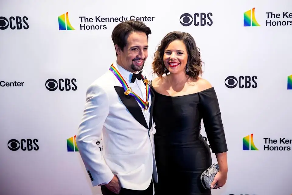 Kennedy Center honoree and Hamilton composer Lin-Manuel Miranda and his wife, Vanessa Nadal, pose on the red carpet before the 41st Annual Kennedy Center Honors in Washington, D.C. in December 2018. 