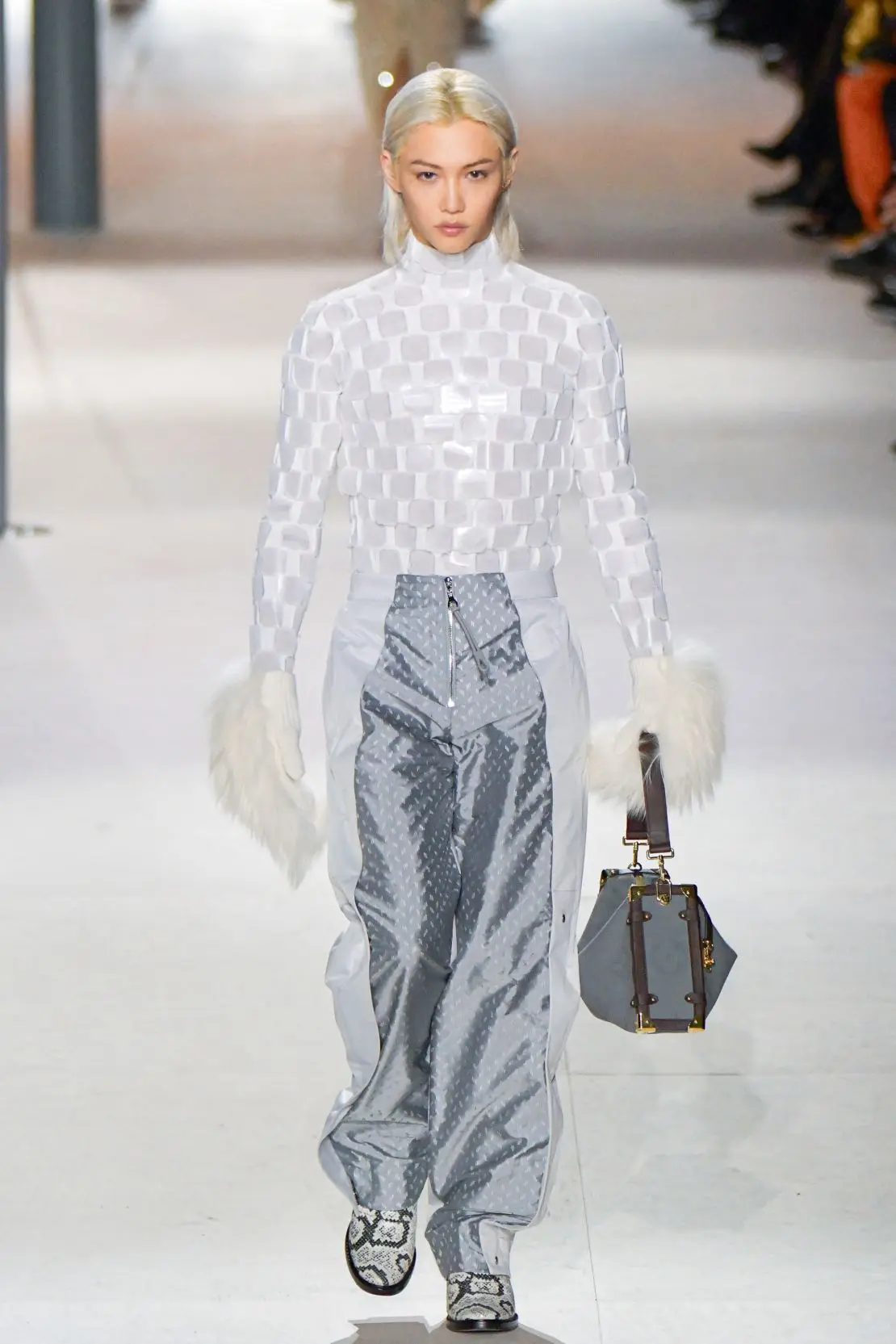 Felix, a member of Stray Kids, made a surprise appearance walking the runway for Louis Vuitton.