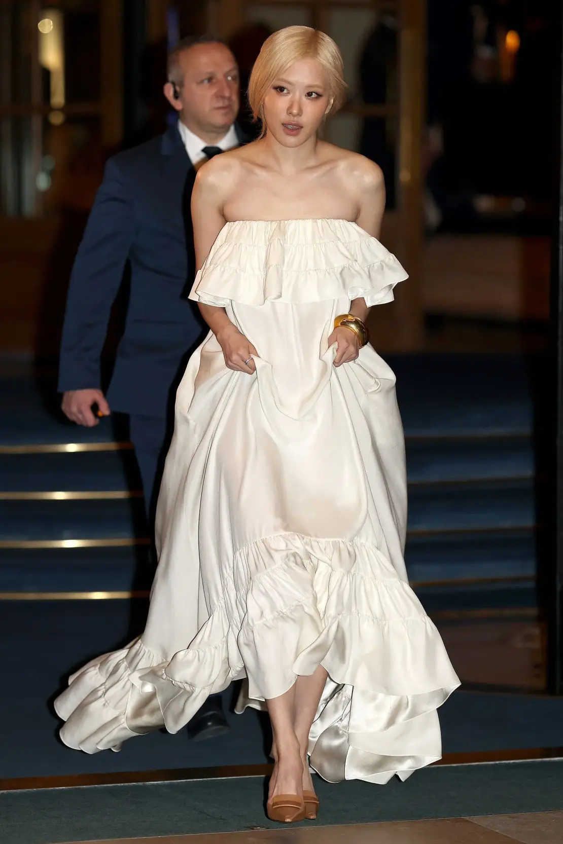 Rosé of Blackpink channeled a fairytale look with her blonde hair and white, off-shoulder dress.