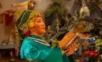 In this provided photo, Van Le participates in a traditional Vietnamese ceremony at Đền Mẫu Vân Hương Vòng Tứ in 2025.