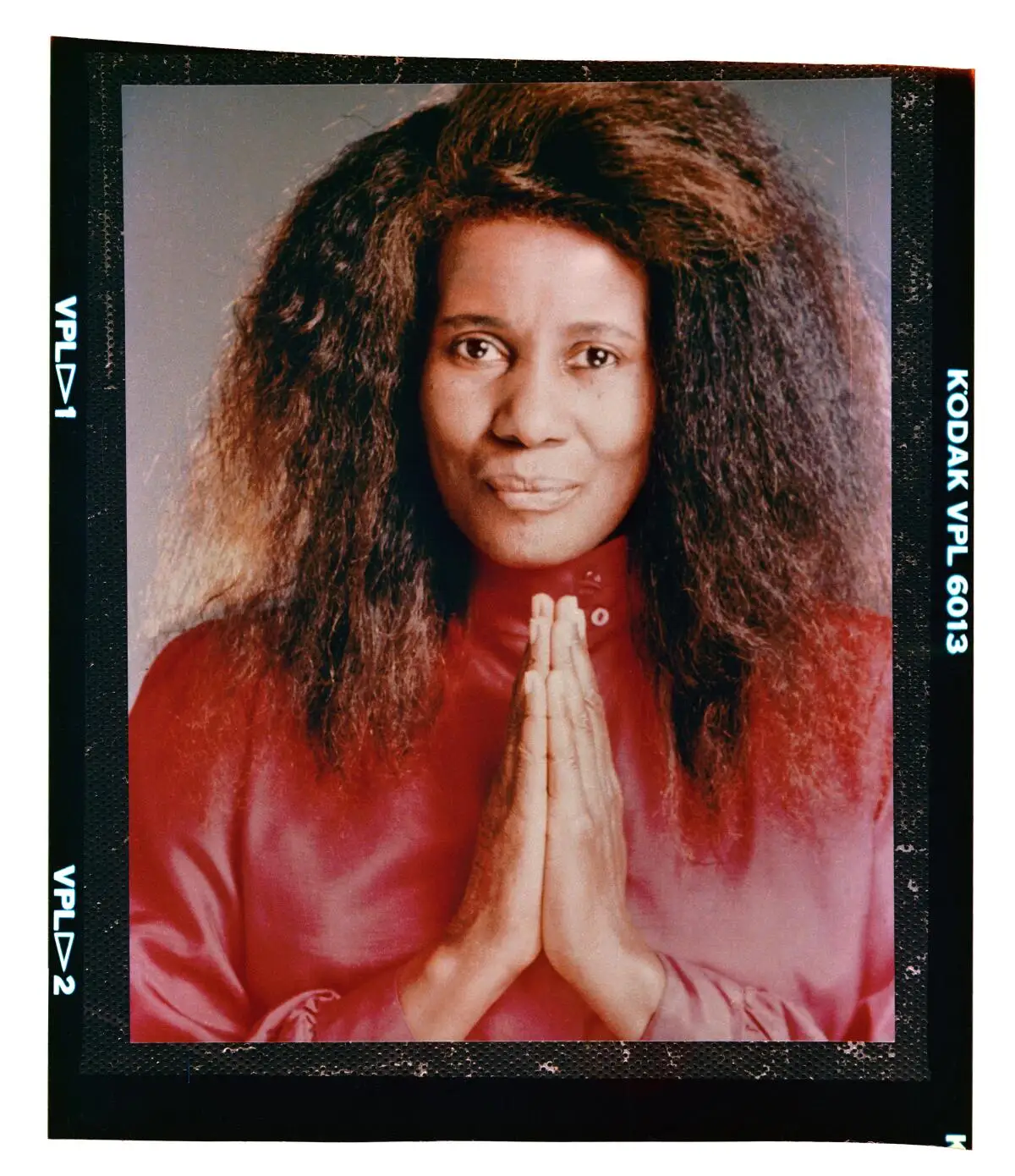 Jazz virtuoso and spiritual guru Alice Coltrane Turiyasangitananda holds her hands in a prayer gesture.