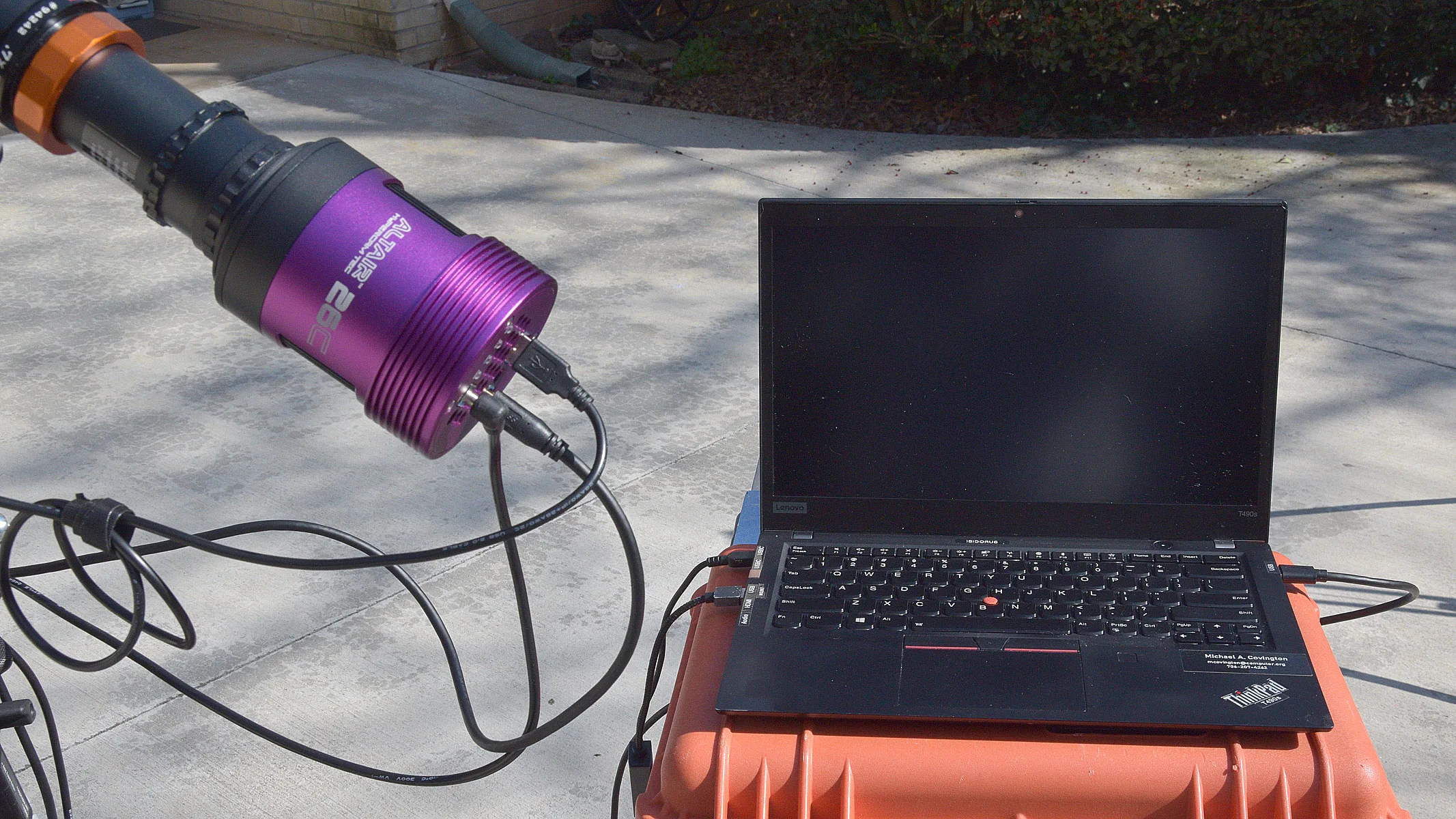A Altair Hypercam 26C APS-C Colour TEC camera on a stand, wired to a laptop.