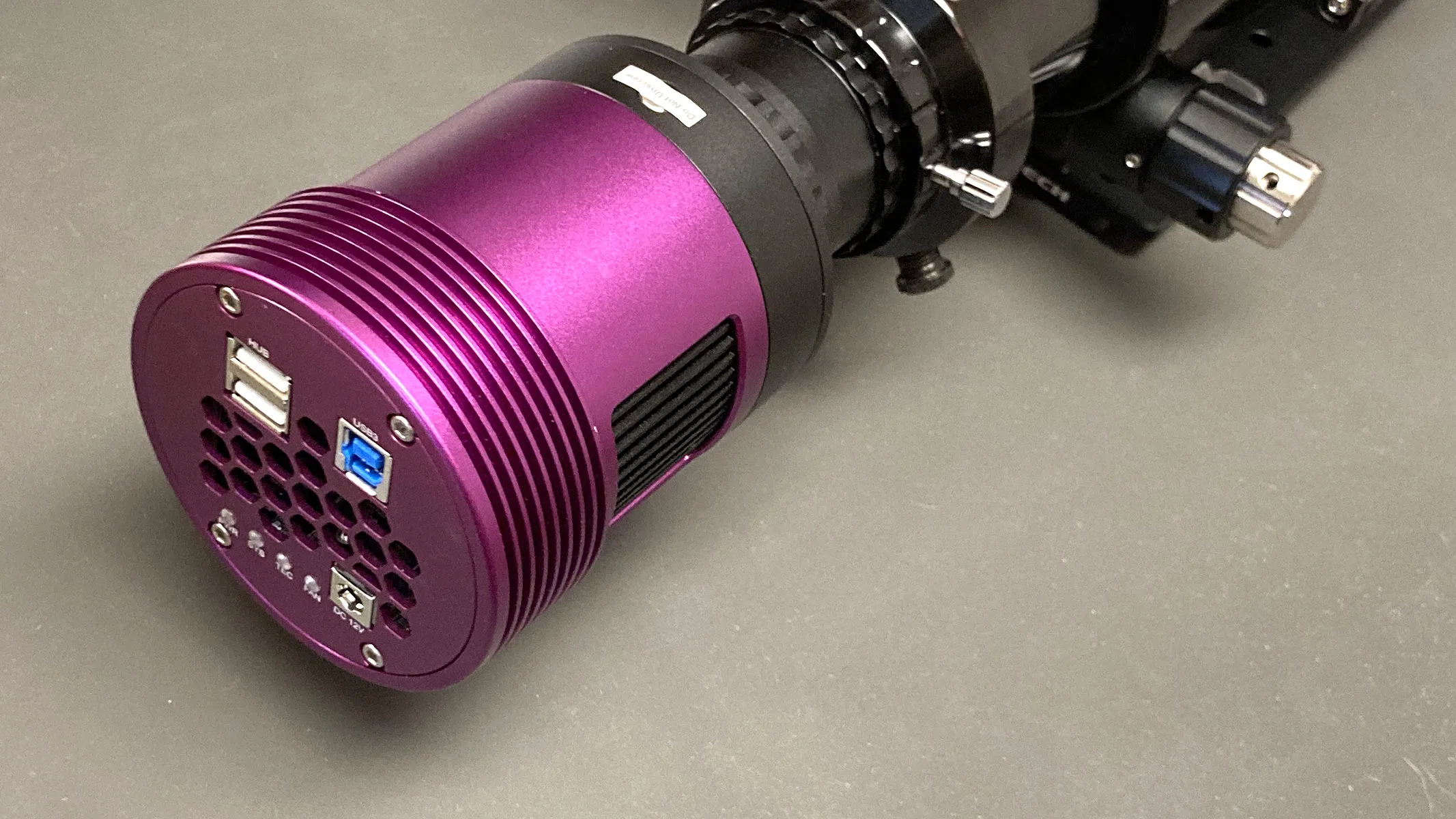 The Altair Hypercam 26C APS-C Astronomy Camera, on a flat surface.