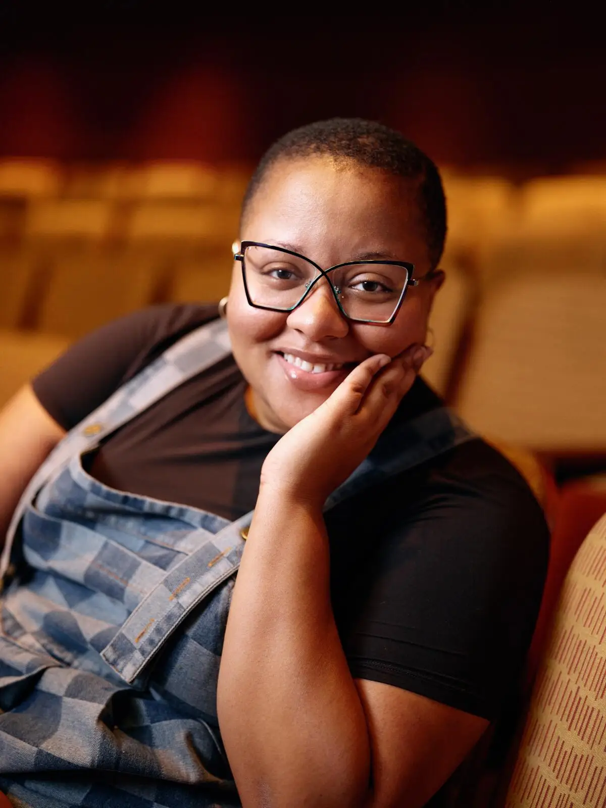 Playwright a.k. payne poses at the Geffen Playhouse, ASK Theater in Los Angeles on Thursday, April 10, 2025. 