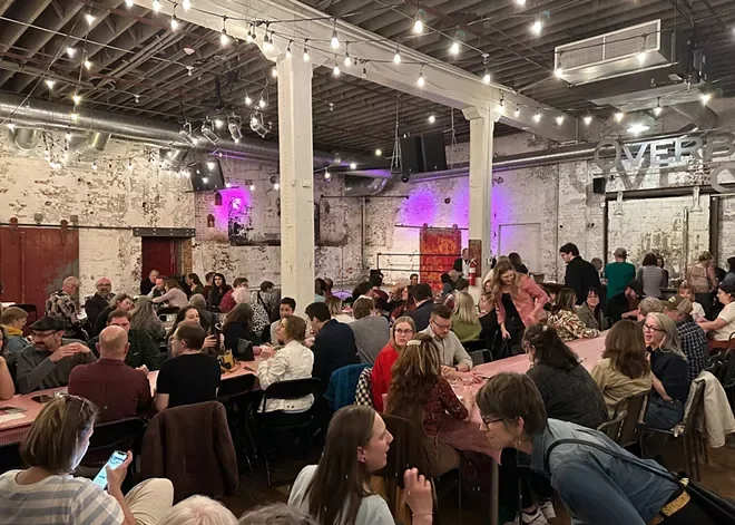 Get Lit! Festival attendees fill the Washington Cracker Building for the festival's popular Pie & Whiskey event.