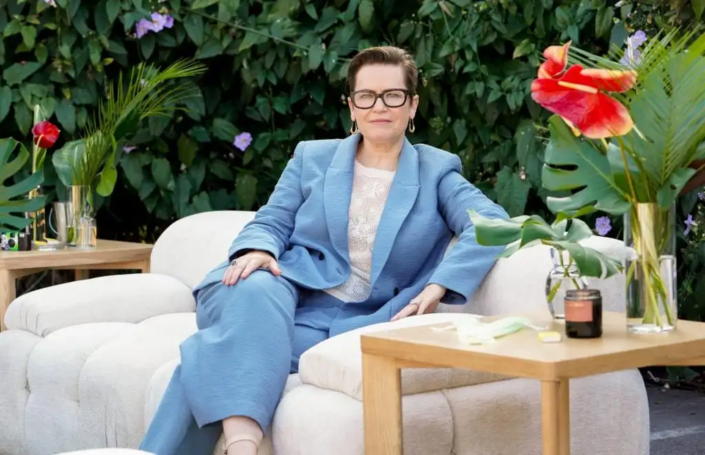 ICA LA director Anne Ellegood poses in a blue suit
