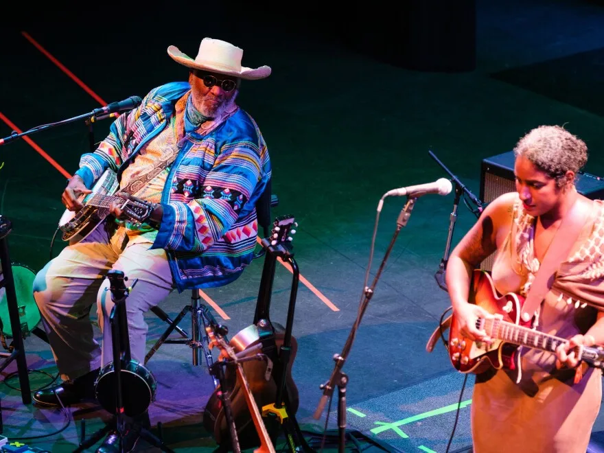 Taj Mahal (left) performs with Leyla McCalla at the festival.