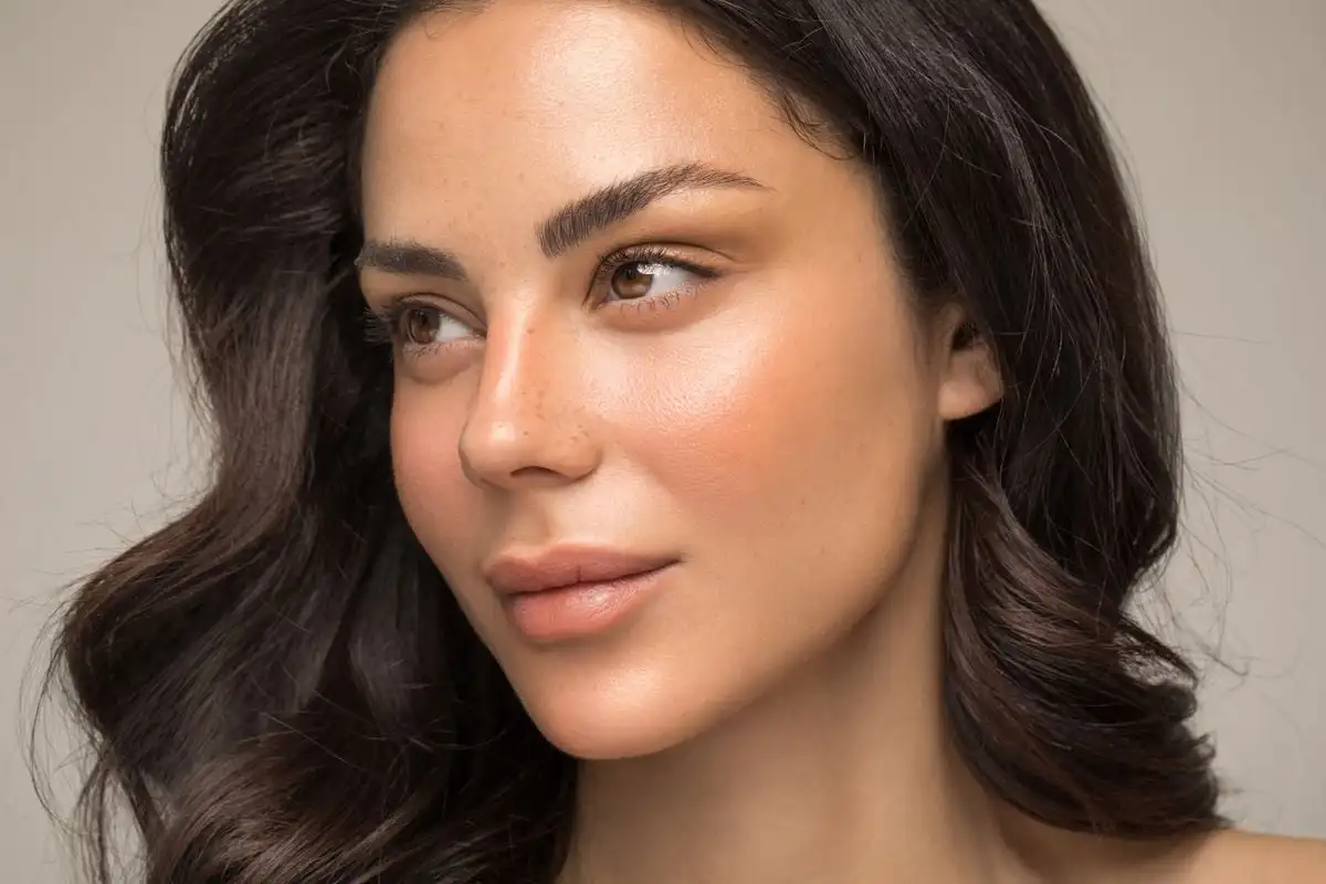 Lightly filled, natural-looking brows—no harsh lines.