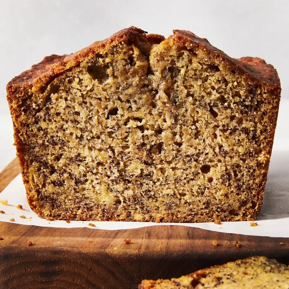 Banana bread banana bread on a wooden cutting board