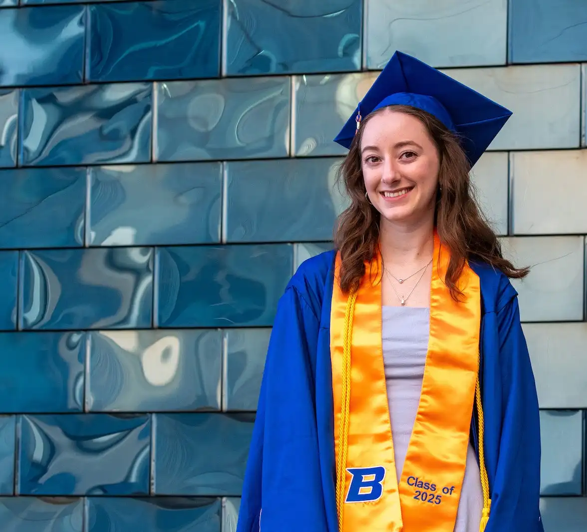 A grad in regalia