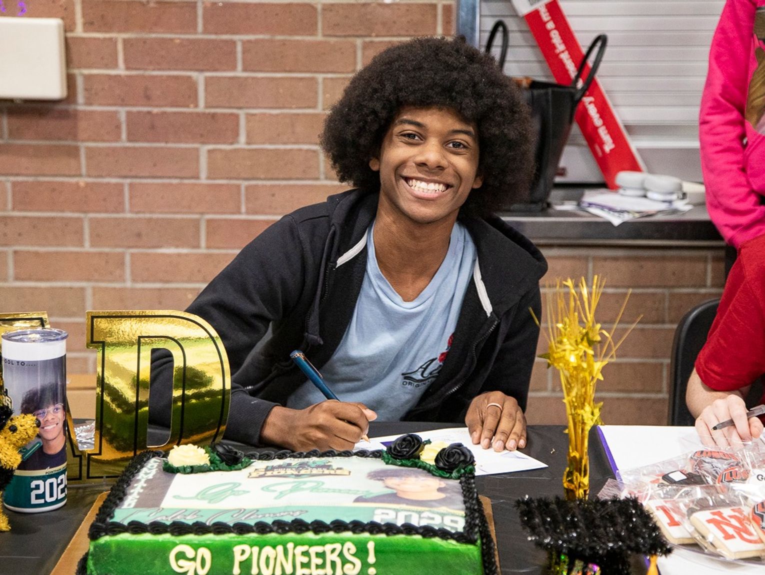 District hosts first arts signing