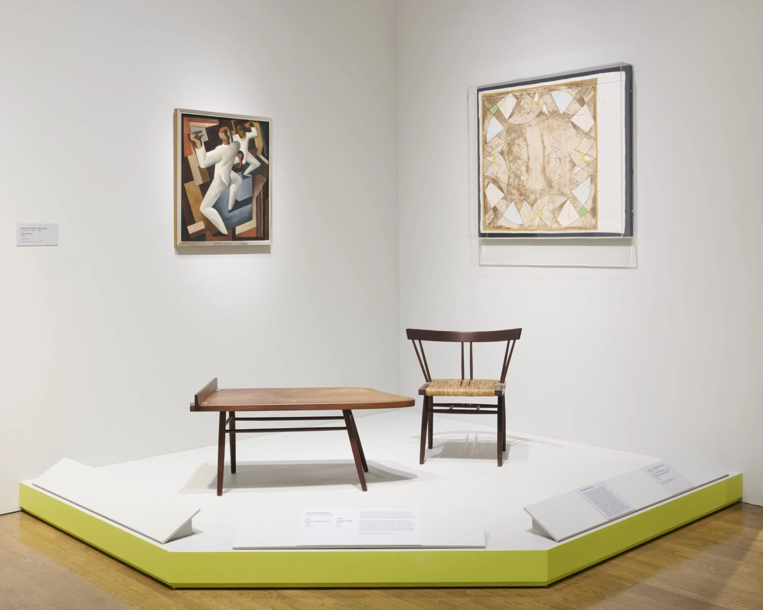wooden furniture in white exhibition space