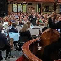Arts & Culture Commission presents $1,000 check to Bristol Brass & Wind Ensemble