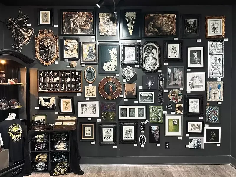 The back wall of the gallery space. - Aurora Gallery and Boutique