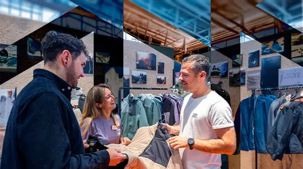 Zwei Personen im Verkaufsgespräch auf einem Stand der ISPO Munich