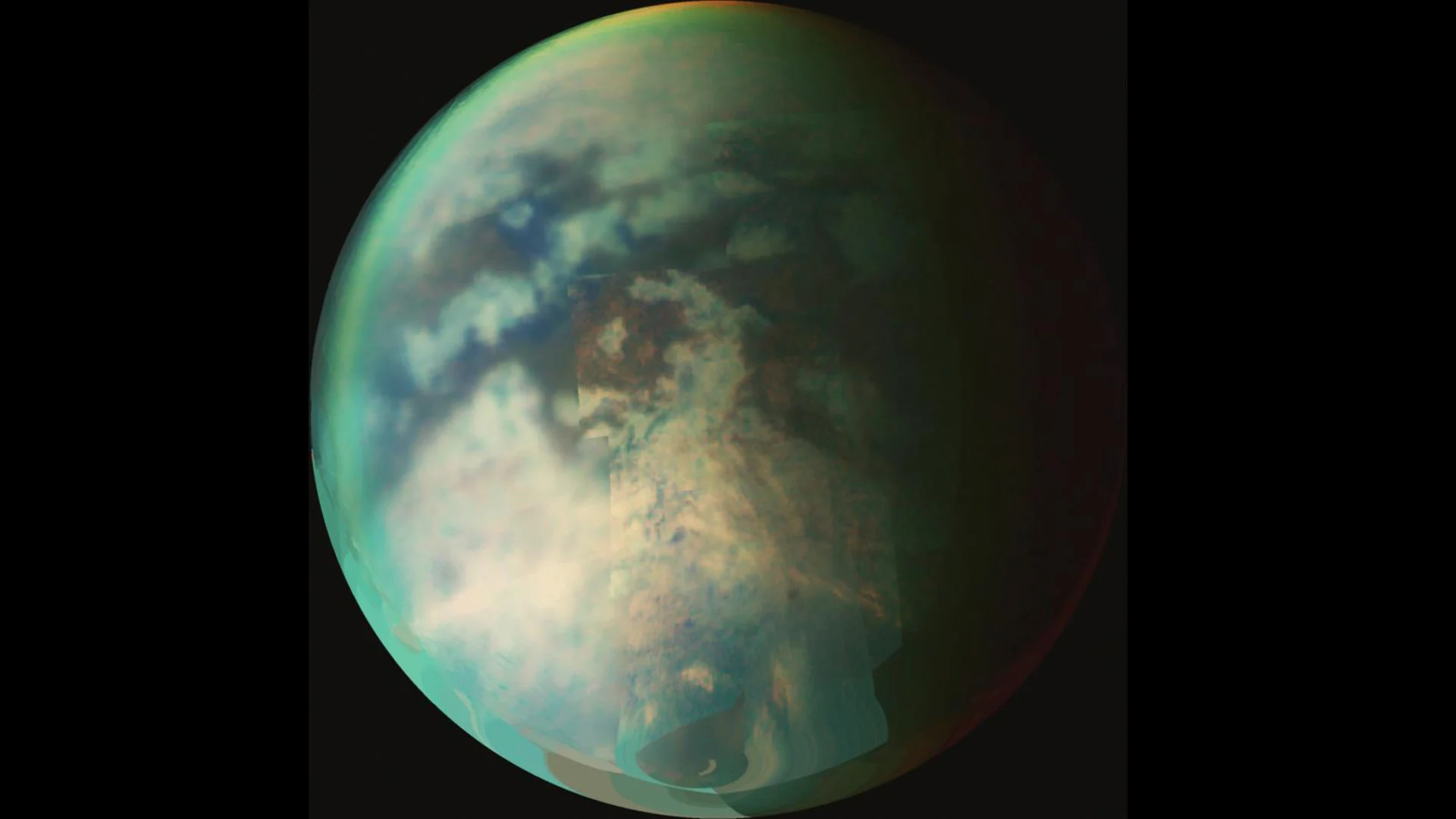 a mottled green orb on a black background