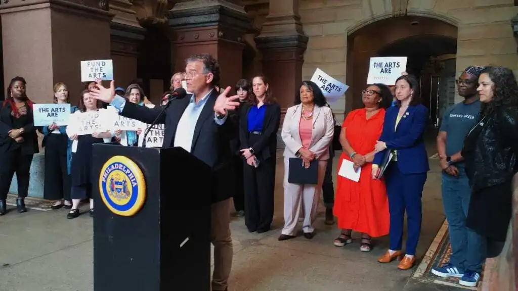 William Valerio speaking at city hall event