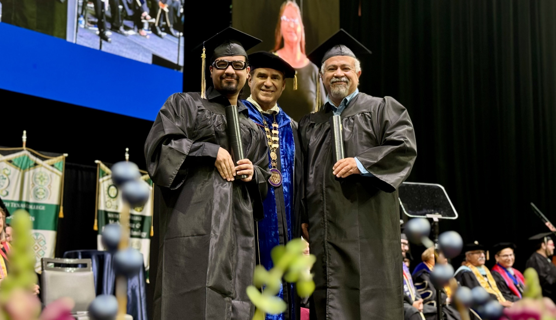 Father and son graduate together marking triumph over autism and adversity
