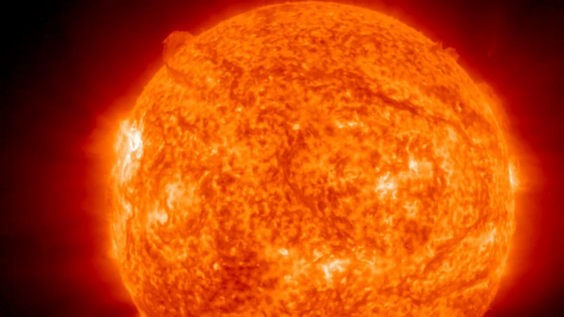 Gif animation showing the x class solar flare erupting from the sun's upper left limb.
