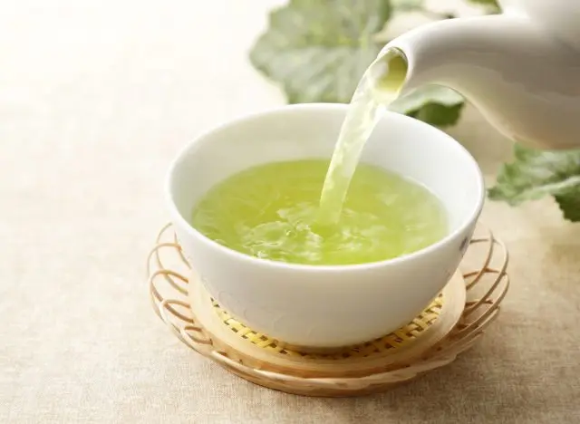 green tea being poured