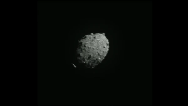 A gif showing a POV getting closer and closer to an asteroid.