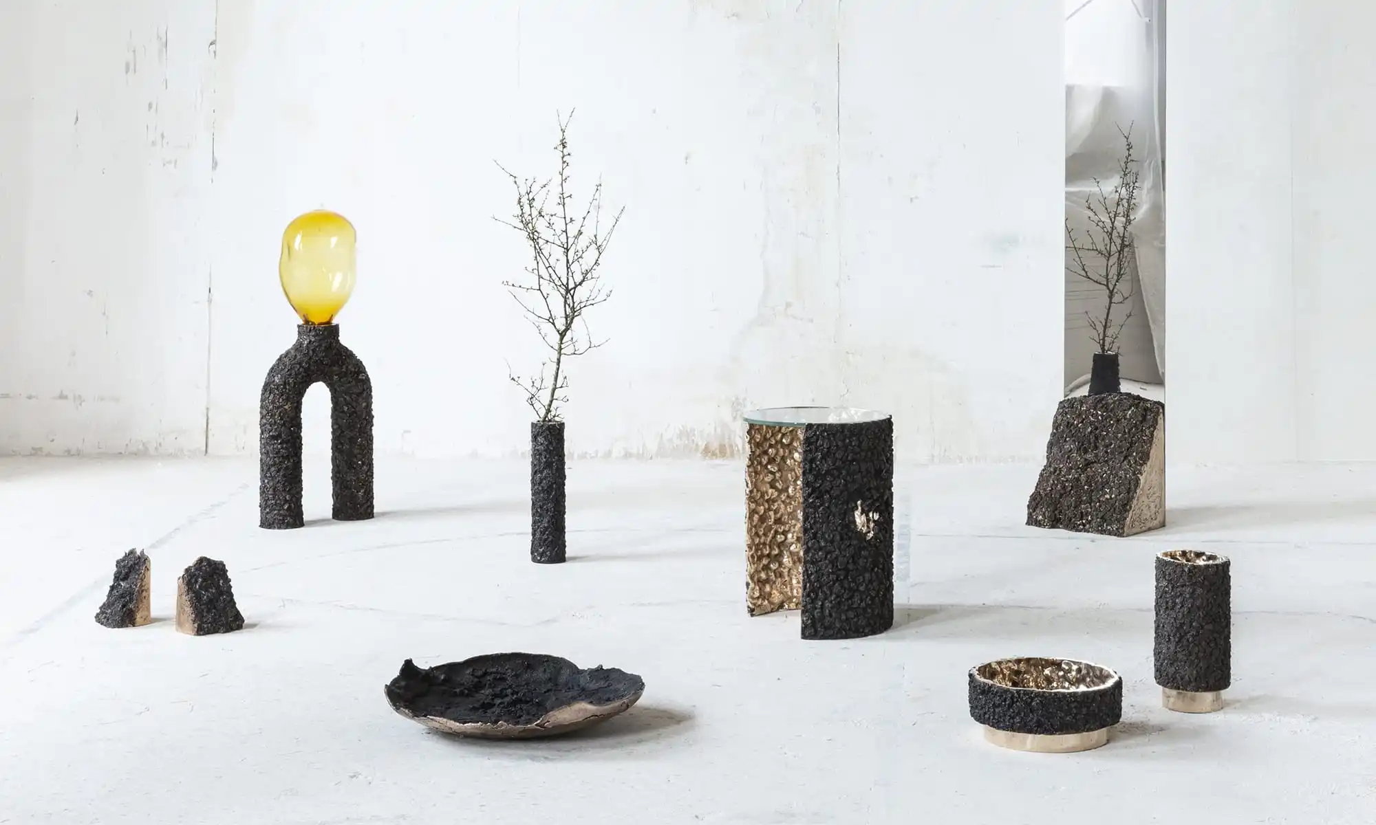 Abstract furniture/decor made to look like wood bark on a white concrete background