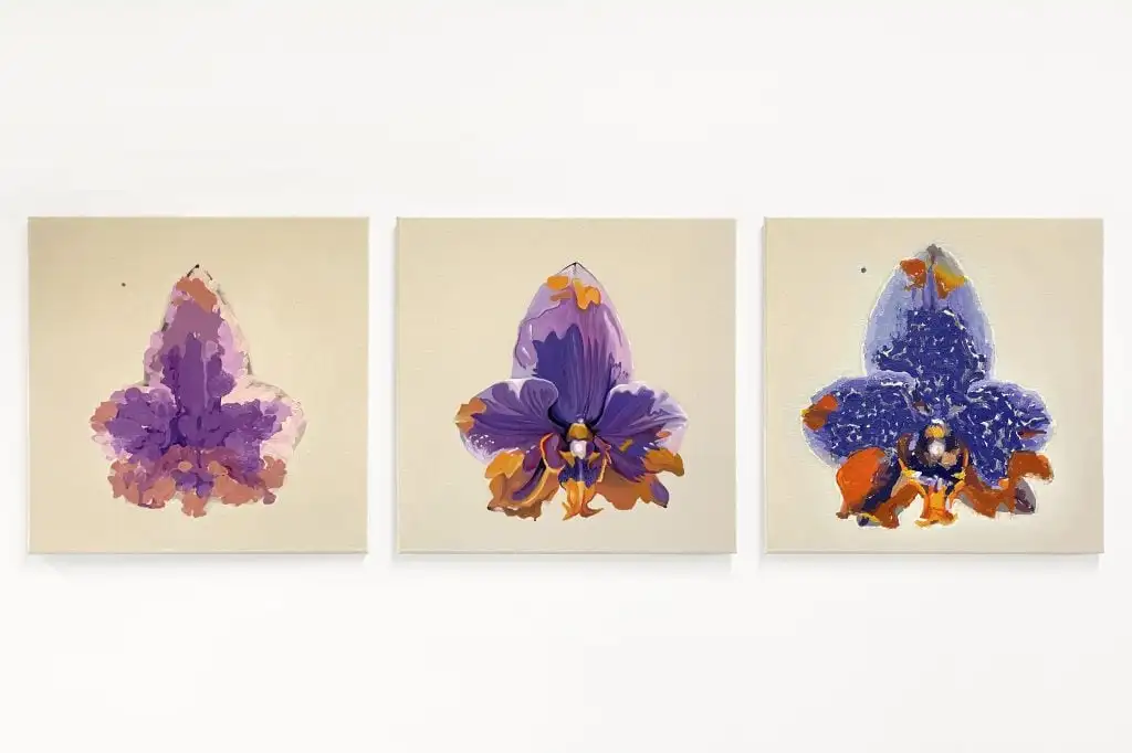 trio of paintings of the same purple and orange flower