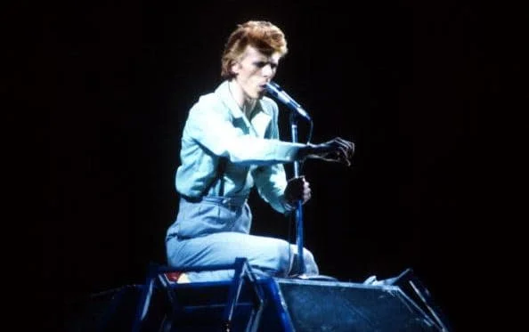 David Bowie performing during his 1974 Diamond Dogs tour
