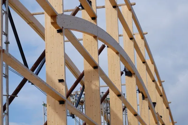 Numerous wooden pieces, including heavy wooden trusses, are seen Thursday, May 29, 2025, at the Upper Macungie Township Community Lifestyle Center. The pieces will ensure the building's longevity. (Oliver Lois Economidis/The Morning Call)