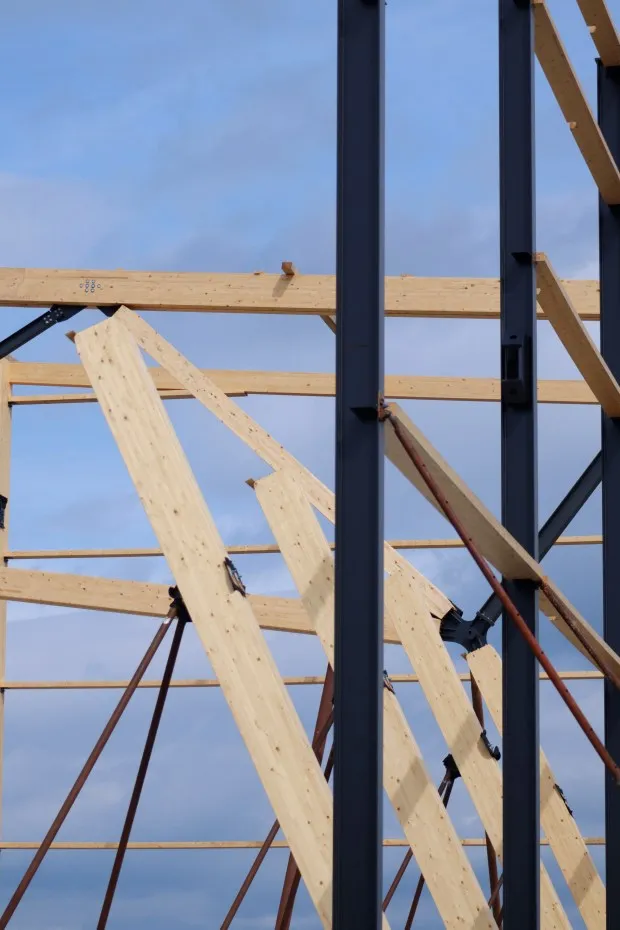 Numerous wooden pieces, including heavy wooden trusses, are seen Thursday, May 29, 2025, at the Upper Macungie Township Community Lifestyle Center. The pieces will ensure the building's longevity. (Oliver Lois Economidis/The Morning Call)