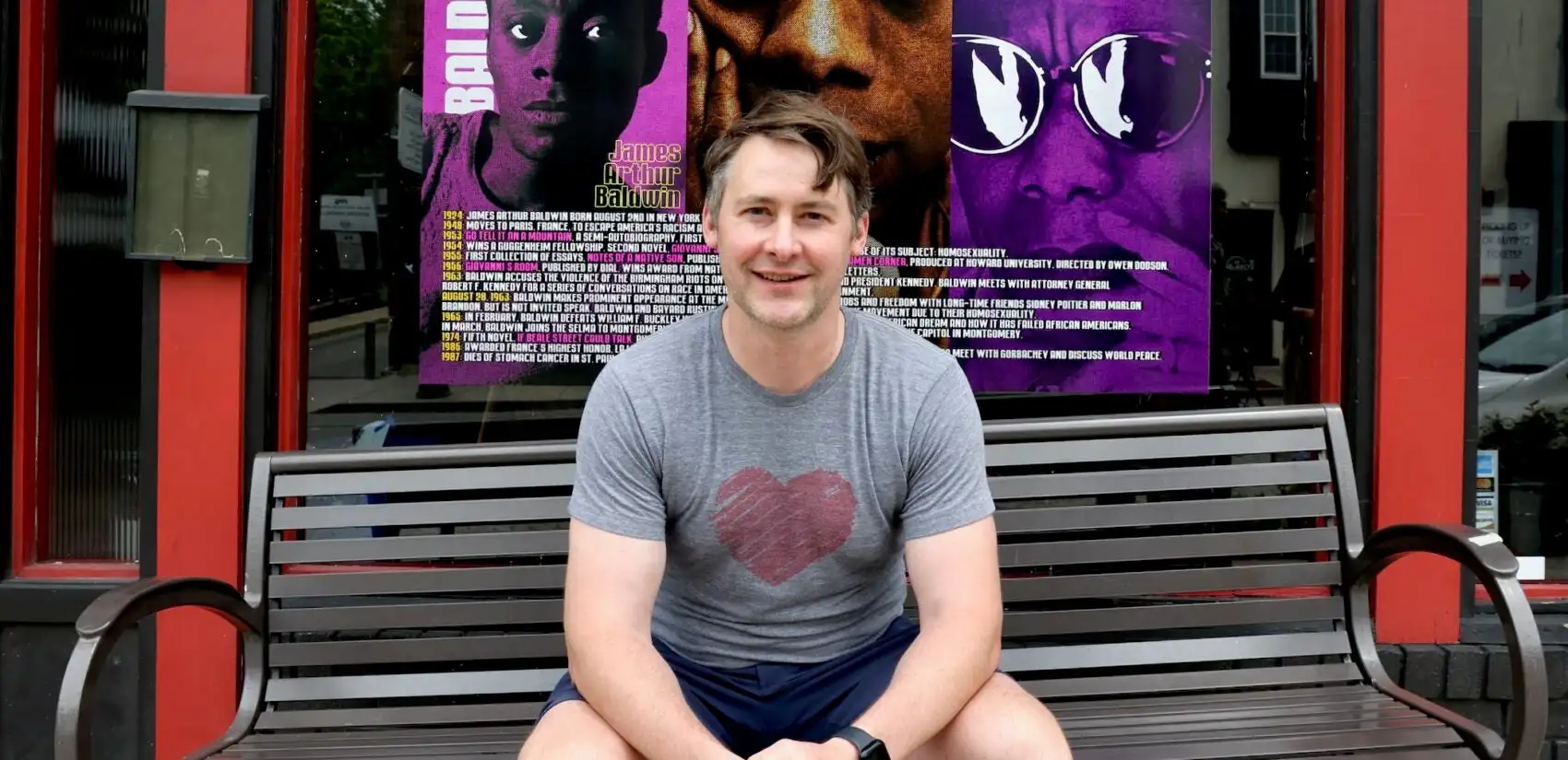 Alex Burns sits and smiles