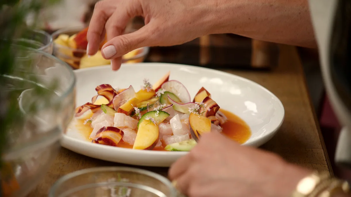 Halibut ceviche being plated.