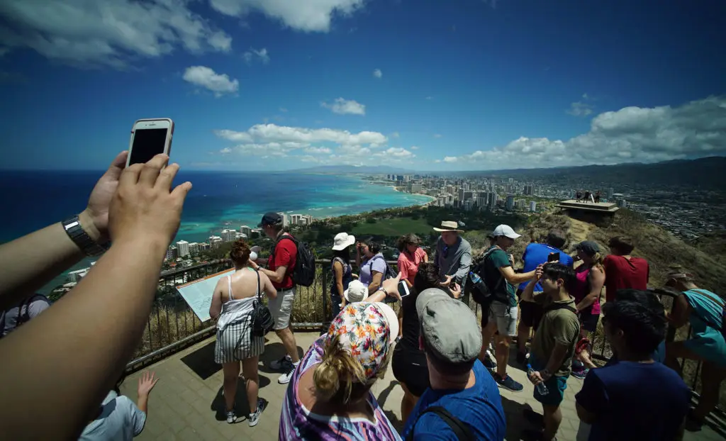 Hikers gather at the summit of Diamond Head lookout.