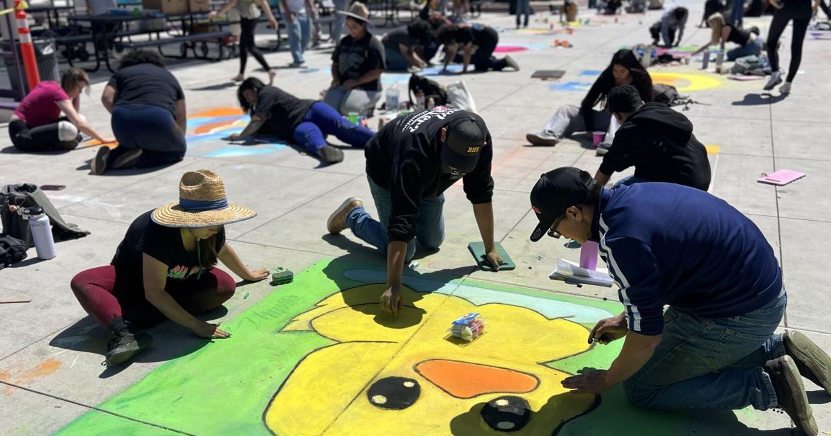 Student art center stage during Righetti art show, chalk festival