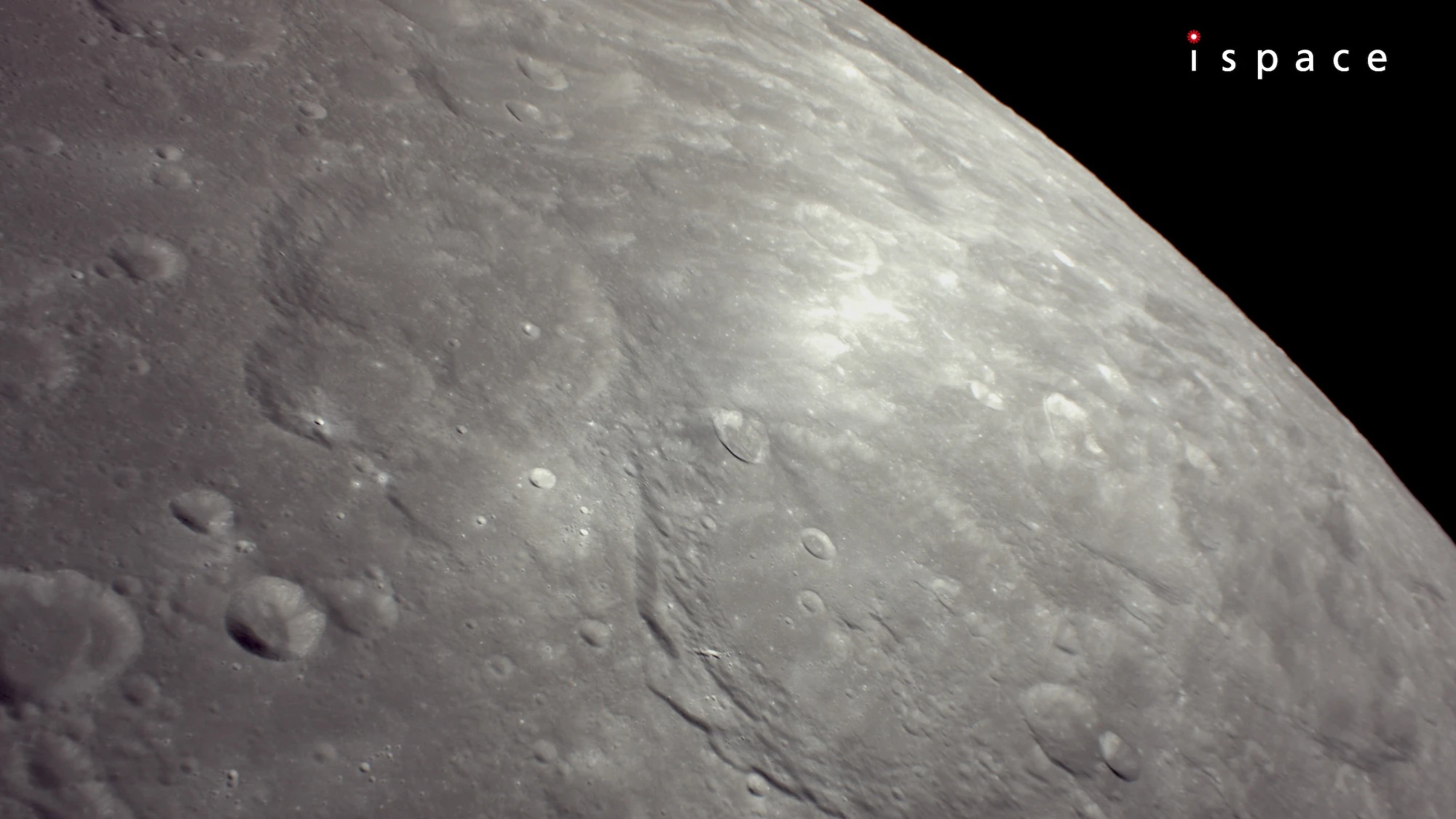 spacecraft view of the moon captured from lunar orbit, showing a number of craters