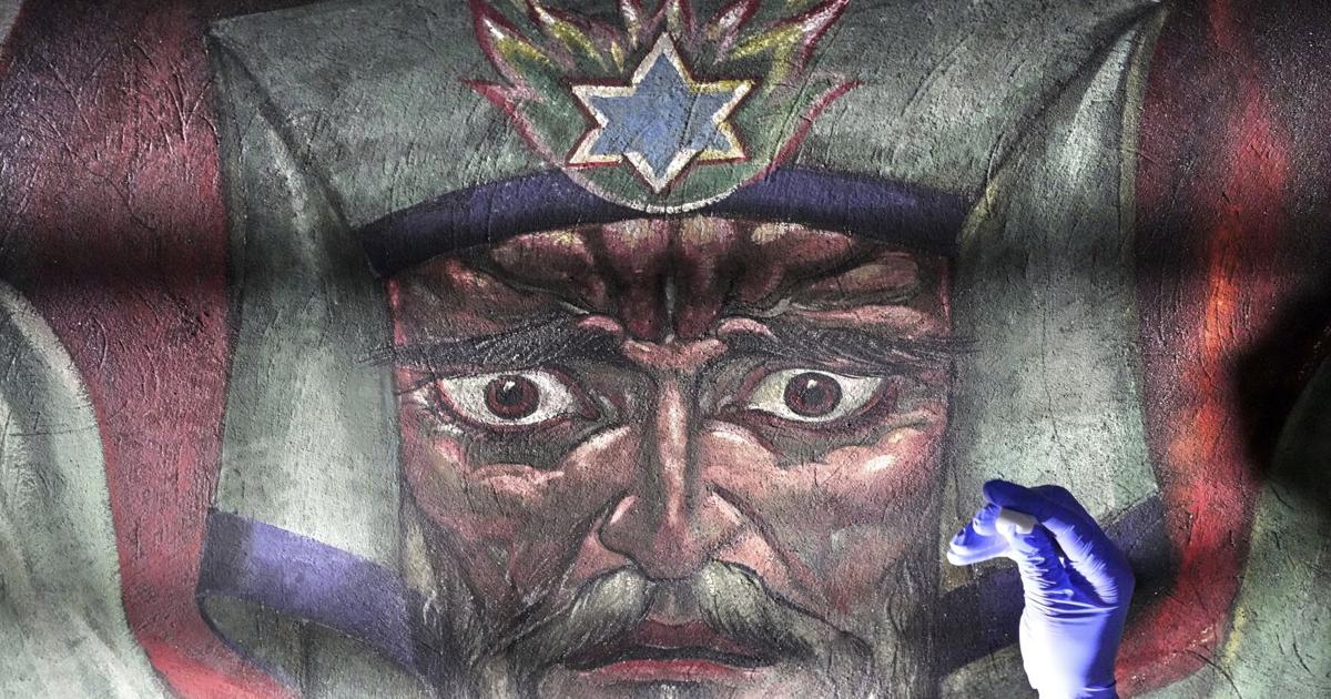 AP PHOTOS: Famed church murals featuring social commentary revived by conservationists