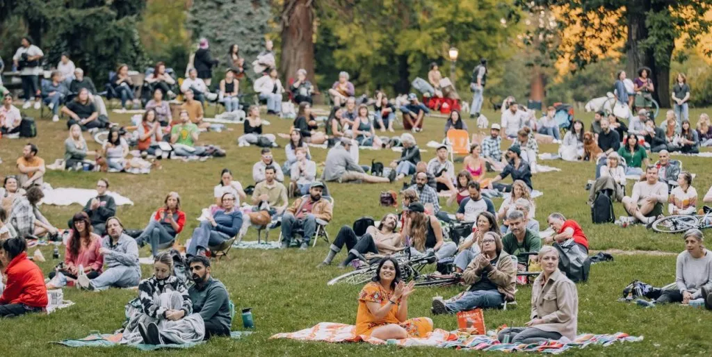 Crowd gathered for a Comedy in the Park performance by Kickstand Comedy, one of many arts groups aided by funding from the Regional Arts & Culture Council. Photo: Sam Gehrke