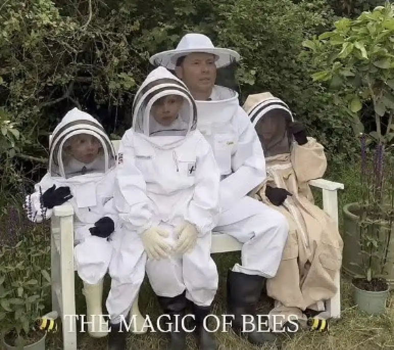Stacey Solomon's husband and their children in beekeeping gear