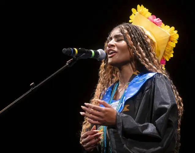 Graduate Nasiya Yates performs during the Pioneer Valley Performing Arts Charter School graduation ceremony at the Academy of Music, Thursday  in Northampton.