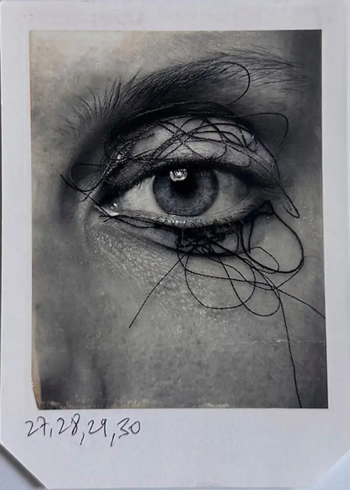 Photo close up on eye with threads by Donna Trope