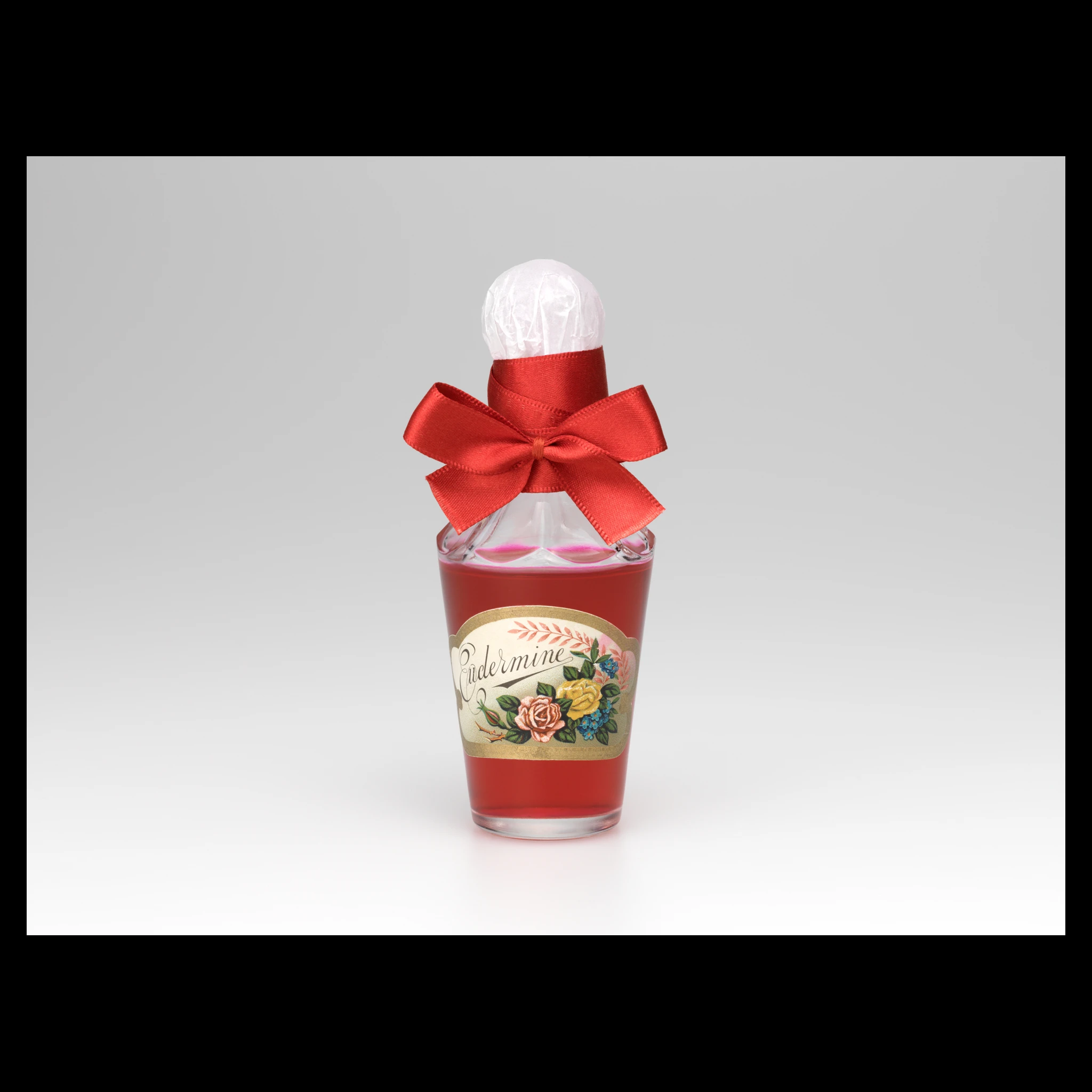 Bottle of Eudermine 1897 in beauty flacon with red ribbon