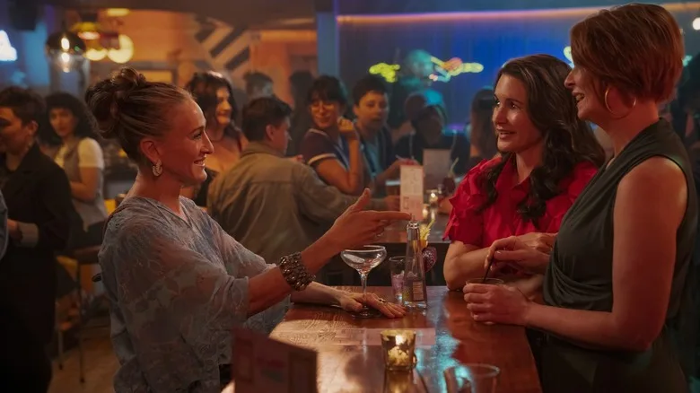 Carrie having drinks with Charlotte and Miranda in And Just Like That
